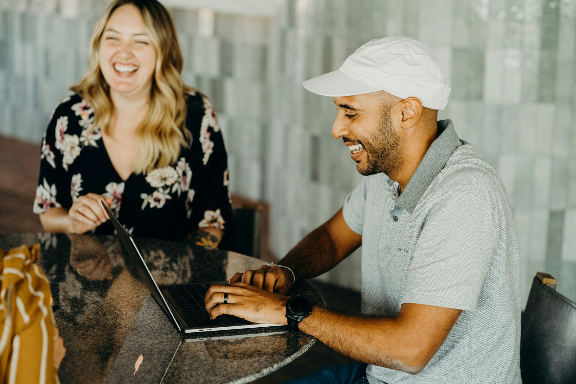 Two participants sharing a laptop